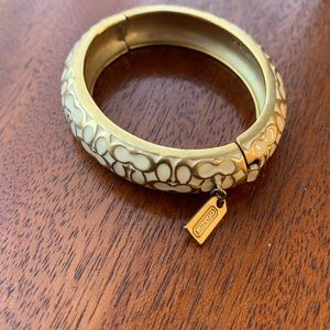White and gold coach bangle bracelet
